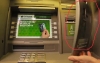 Мошенники с помощью скиммера похитили пин-коды 180 банковских карт