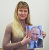 Владимир Путин подарил калужской чиновнице своё фото с автографом 