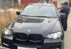 У директора строительной фирмы забрали BMW X6 за долги прямо на дороге